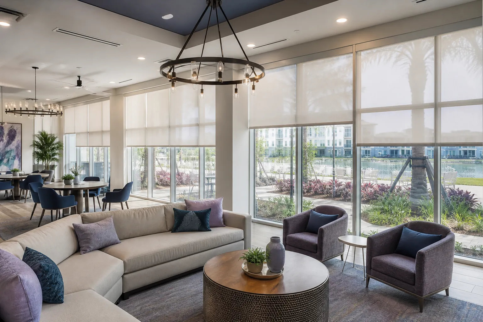 Light-filtering commercial roller shades in a Nocatee apartment clubhouse